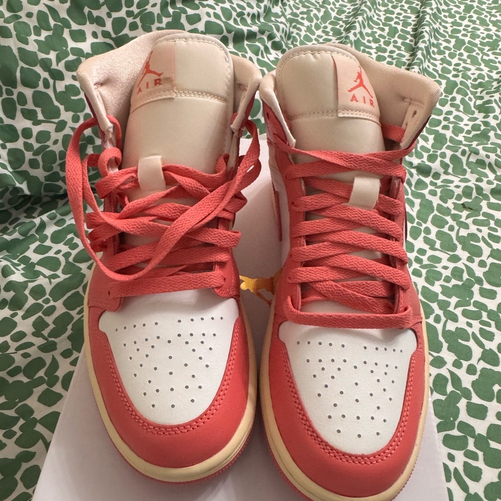 Nike 1s in pink and cream